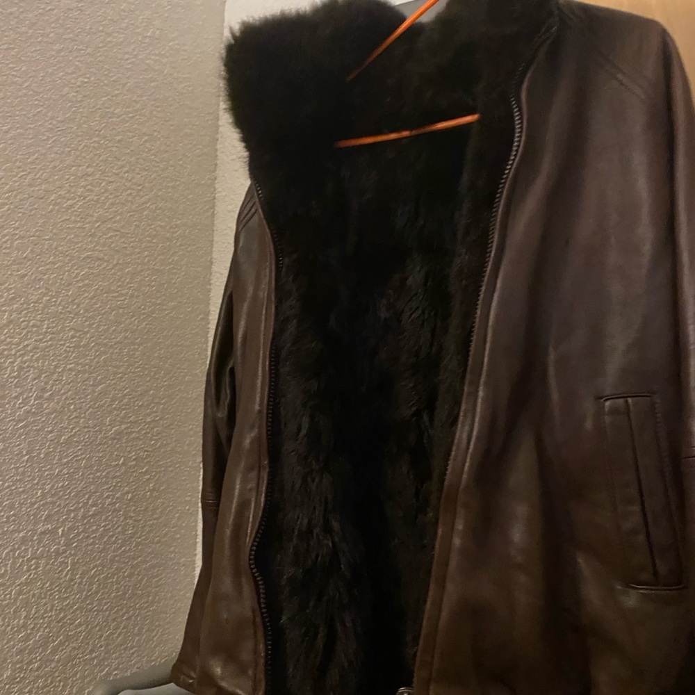 Brown leather jacket with fur inside